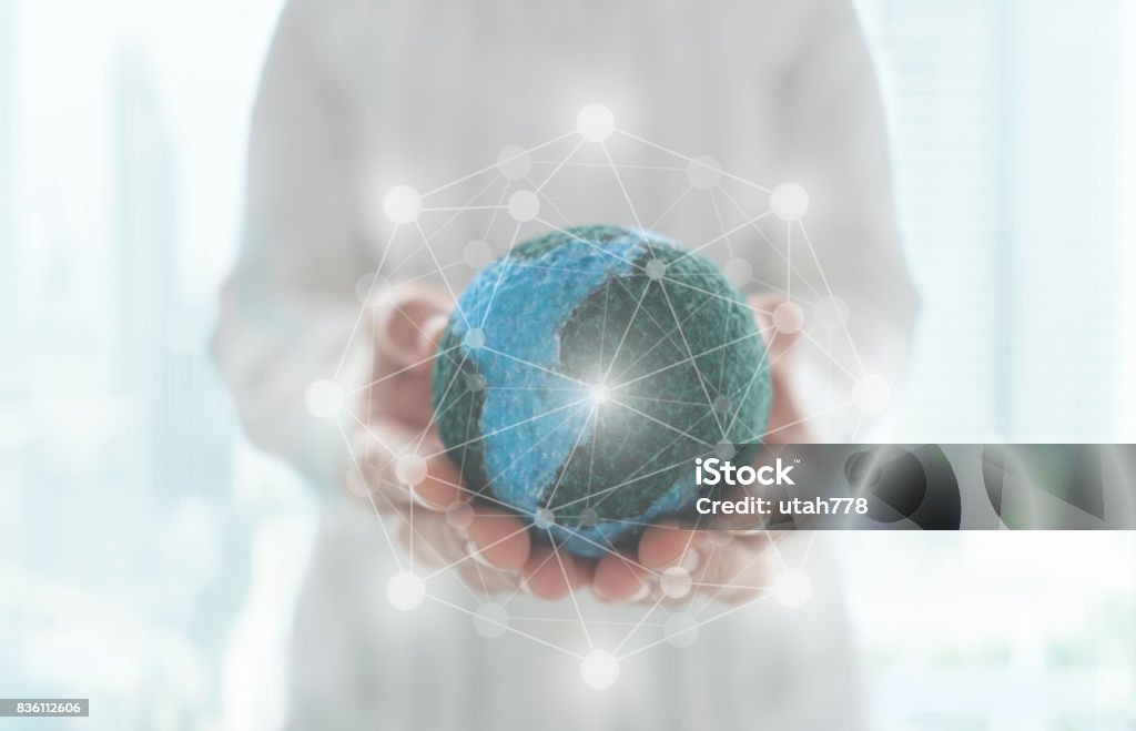 global network global network and connect communication concept. mock up the global on hand with digital networking. Global Communications Stock Photo