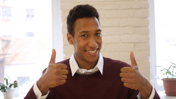 istock Thumbs Up with both Hands by Afro-American Man 836112722