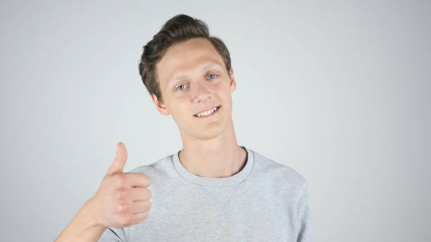 istock Thumbs Up by Young Man, Isolated 836113260