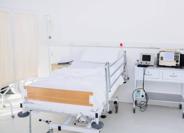 istock Empty bed in the hospital room 836119794