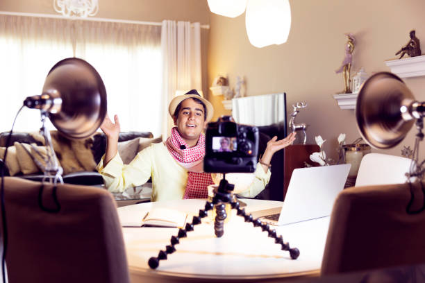 istock Enthusiastic traveling about his recent exploits towards his camera that is broadcasting live 836123424