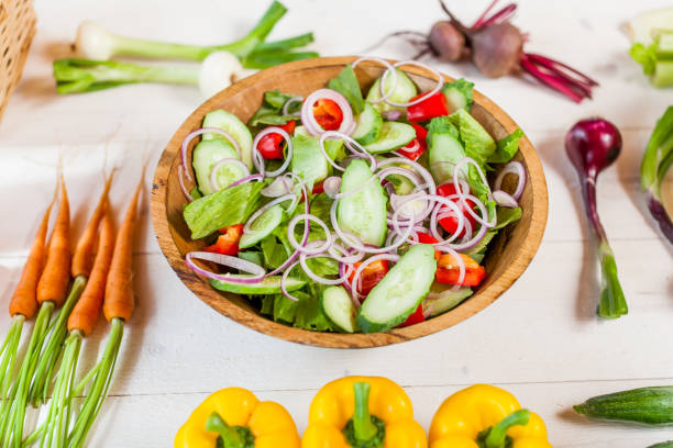 istock vegetable salad bowl on kitchen table, balanced diet 836128660
