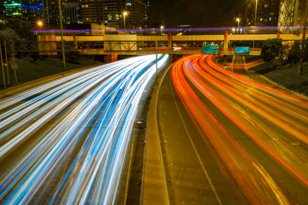 istock Headlamp trails on the highway 836131696