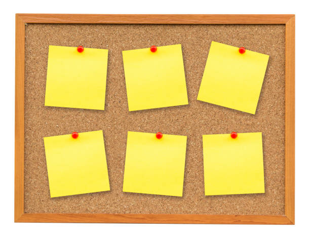 Six note paper on Cork board isolated on white with clipping path.
