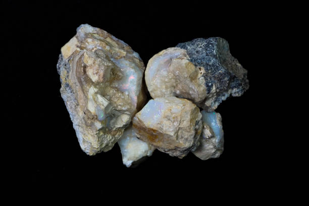 istock Opal Rough Raw Rocks Gemstone from Mine USA Black Background 836139930