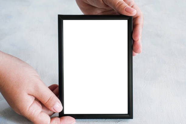 istock Picture frame tenderly holding in hands 836146878