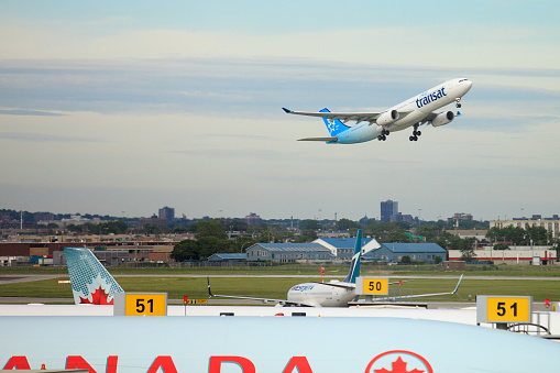 A low budget airline’s jet is taking off at the Dorval airport in Montreal
