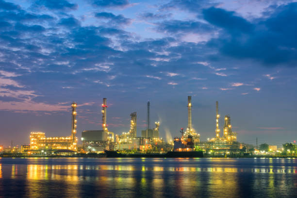 istock Oil refinery plant and shipping loading dock at twilight scene 836160962