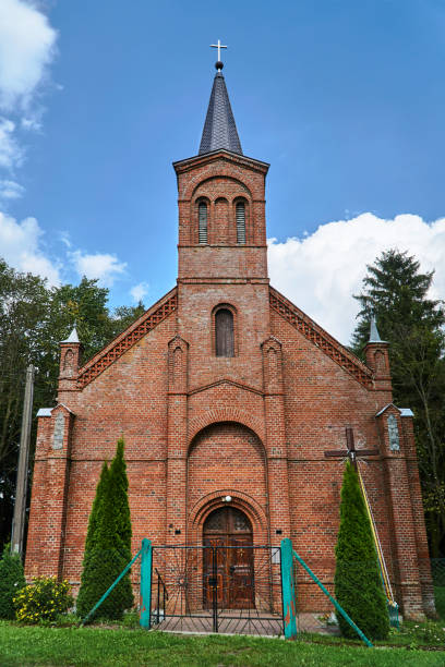 istock Neogothic village church with bell tower 836169154