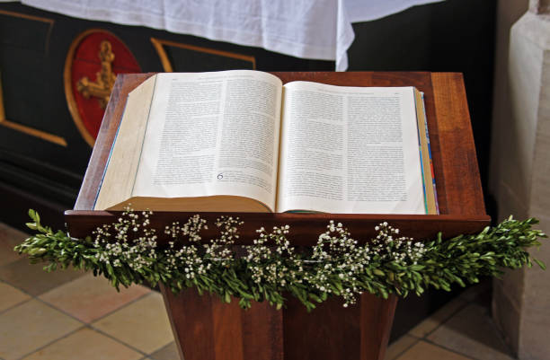 A set of witnesses for the rite of baptism lies on a small table in the temple
