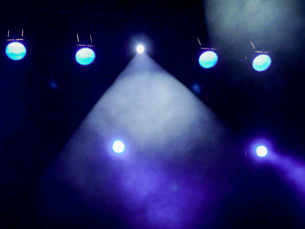 istock Lighting equipment on the stage. The spotlight through the smoke. Theater performance 836179794