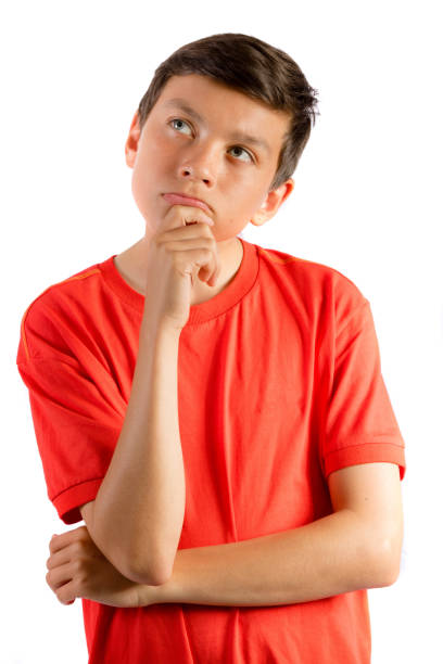 istock Young teenage boy isolated on white thinking 836183374