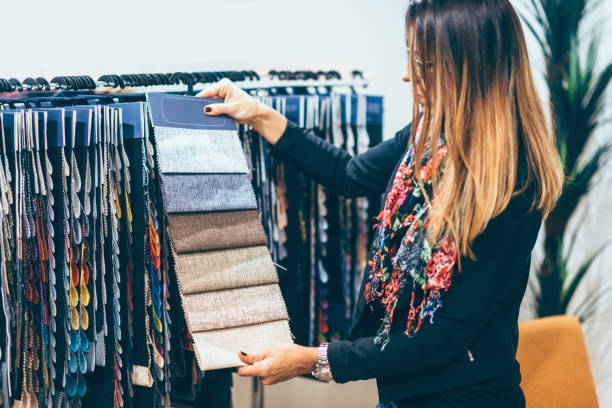 istock Interior designer looking at fabric swatches 836185254