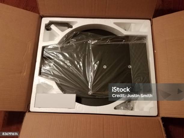 Base Of A Dobsonian Telescope In A Box Stock Photo - Download Image Now - Astronomy, Bag, Black Color