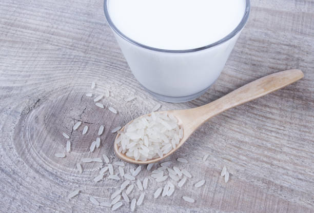 istock Rice milk on the wooden background . 836193418