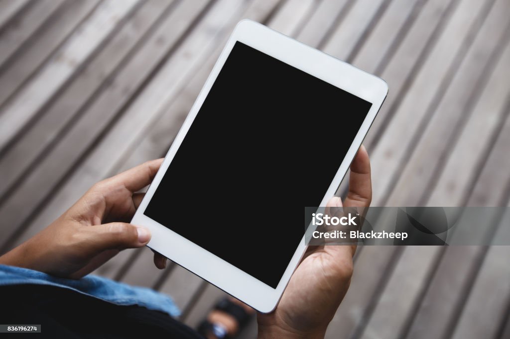 digital tablet in hand on top angle view Digital Tablet Stock Photo