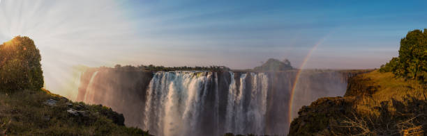 Victoria Falls (Zimbabwe) The great Victoria Falls near Livingstone in Zimbabwe landscape fog africa beauty in nature stock pictures, royalty-free photos & images