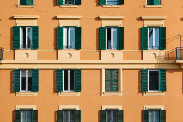 Facade of an orange italian building stock photo
