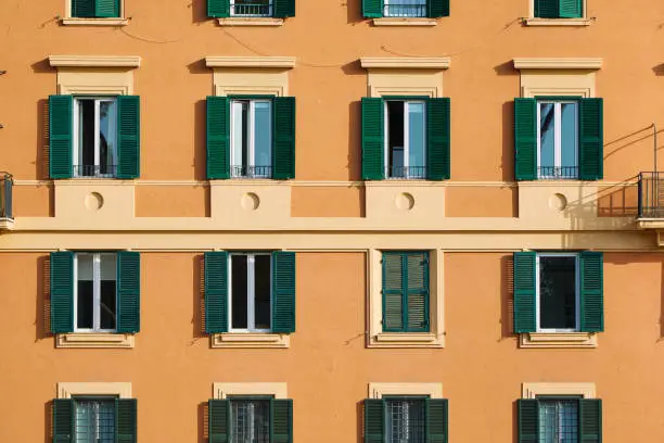 Photo of Facade of an orange italian building