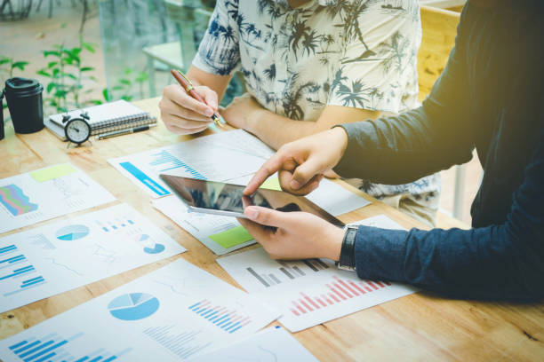 istock Teamwork concept Young creative coworkers working with new startup project in modern office Business. 836204340