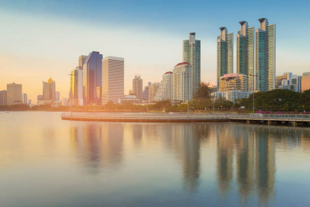 istock City downtown building with water reflection in public park 836205346