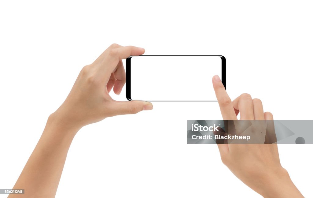 mano que sostiene el smartphone móvil y tocar la pantalla aislada sobre fondo blanco, camino de cliping dentro - Foto de stock de Mano libre de derechos