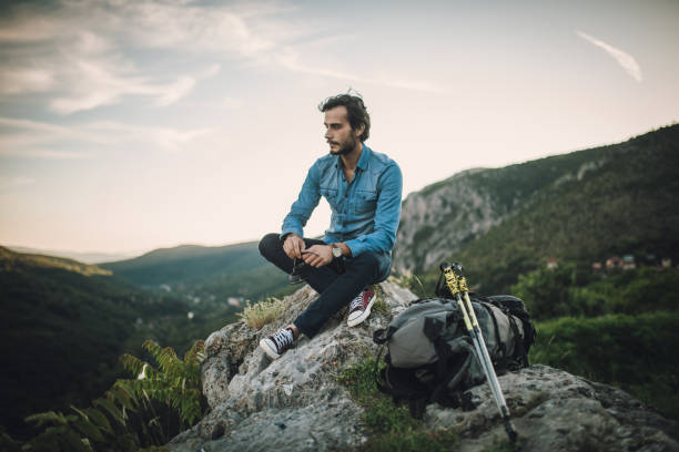istock Hiker enjoying a view from the top 836212658