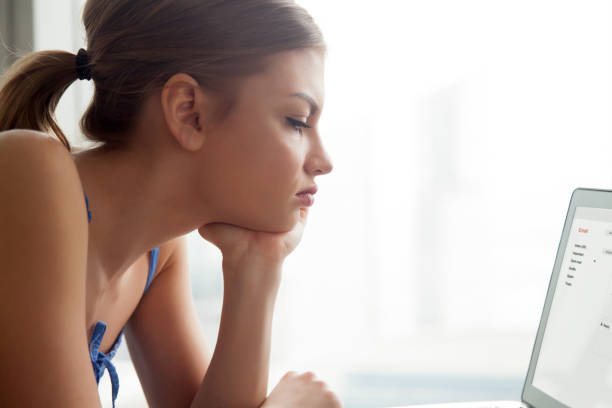 istock Woman reading e-mail letter on laptop screen 836212746