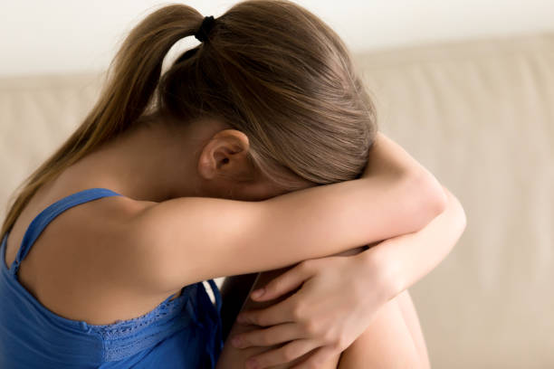 istock Lonely woman hugging knees and crying 836212896