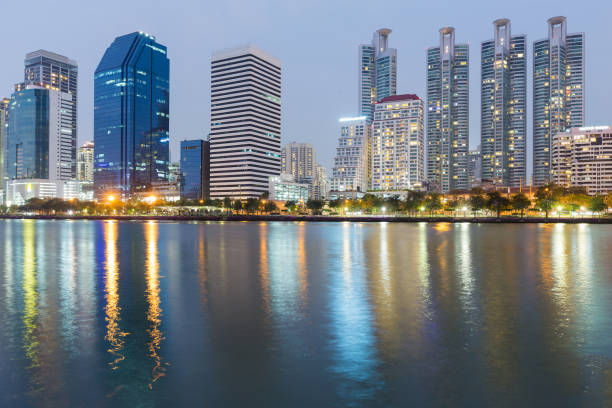 istock Night city building with water reflection at twilight 836215834