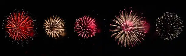 colorful fireworks at night sky - party celebration concept - fireworks  on black background