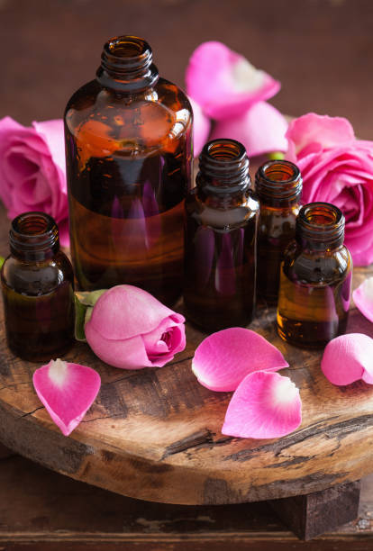 istock Essential oil and rose flowers aromatherapy spa perfumery 836219642