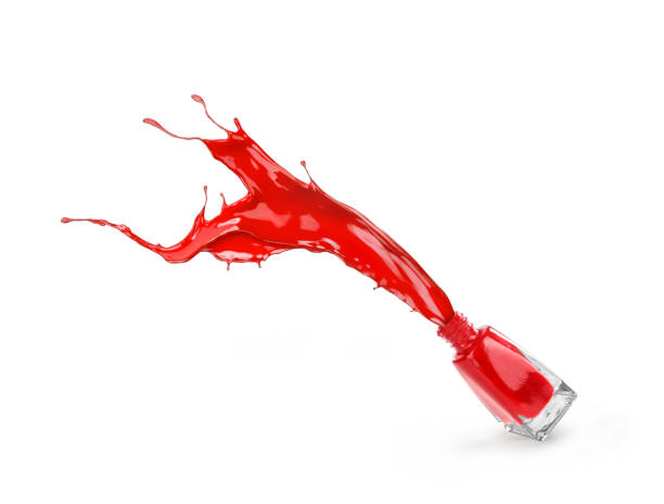 istock red nail polish splash from glass bottle 836219860
