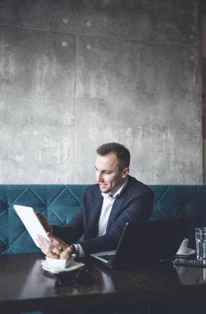istock Business man in cafe 836220824
