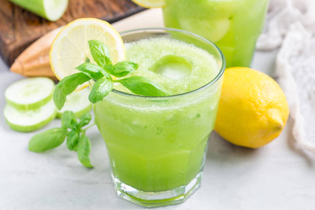 istock Healthy lemonade with cucumber, basil, lemon, honey and sparkling water, horizontal 836226590