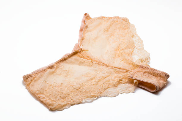 istock Beautiful beige lingerie on white background 836227516