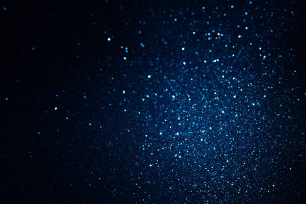 istock glitter vintage lights background. blue and black. de focused 836238292