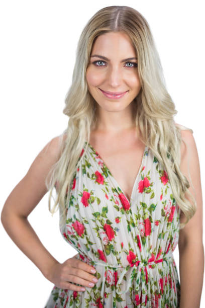 istock Happy blonde wearing flowered dress posing 836244688