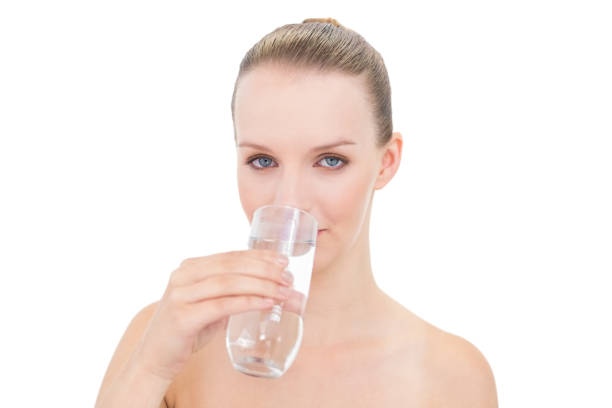 istock Calm pretty blonde model drinking water 836245568