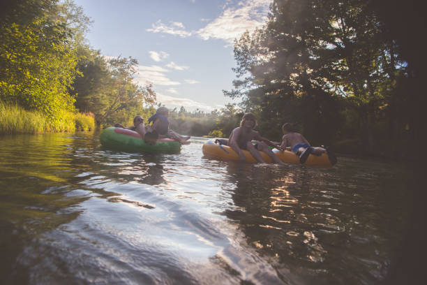 istock Tubing in river 836252658