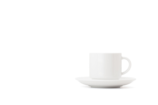 white ceramic cup of coffee isolated on white background with clipping path and soft shadow
