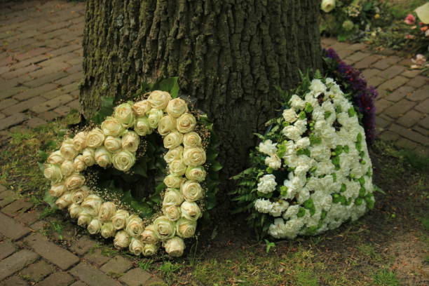istock Sympathy flowers near a tree 836272756