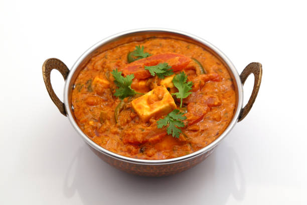 istock Indian Food or Indian Curry in a copper brass serving bowl. 836284242