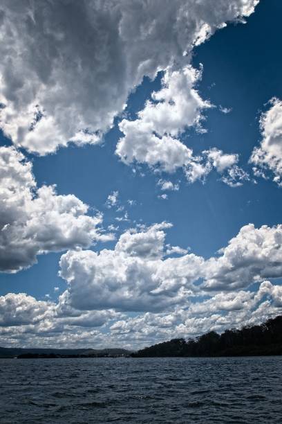 istock White Cumulonimbus cloud in blue sky at sea. 836284366