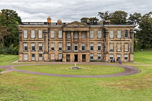 Calke Abbey, England -  October 20, 2014: Mansion is in care of National Trust and is presented as an illustration of the country house in decline, fate met by many other English country estates.