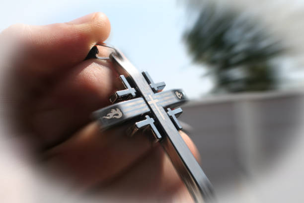 Religious Cross In Hand Zoom Burst High Quality Religious Cross In Hand Zoom Burst High Quality francis bacon stock pictures, royalty-free photos & images
