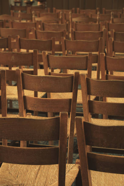 istock Wooden chairs in a church 836332476