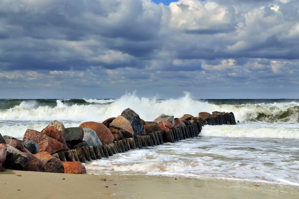 istock Stormy Baltic sea and breakwater 836332614