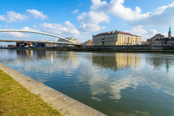 istock Steel bridge over Vistula river on sunny day, Krakow, Poland 836340168