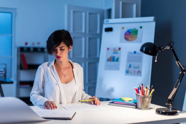 istock Businesswoman working late 836343654